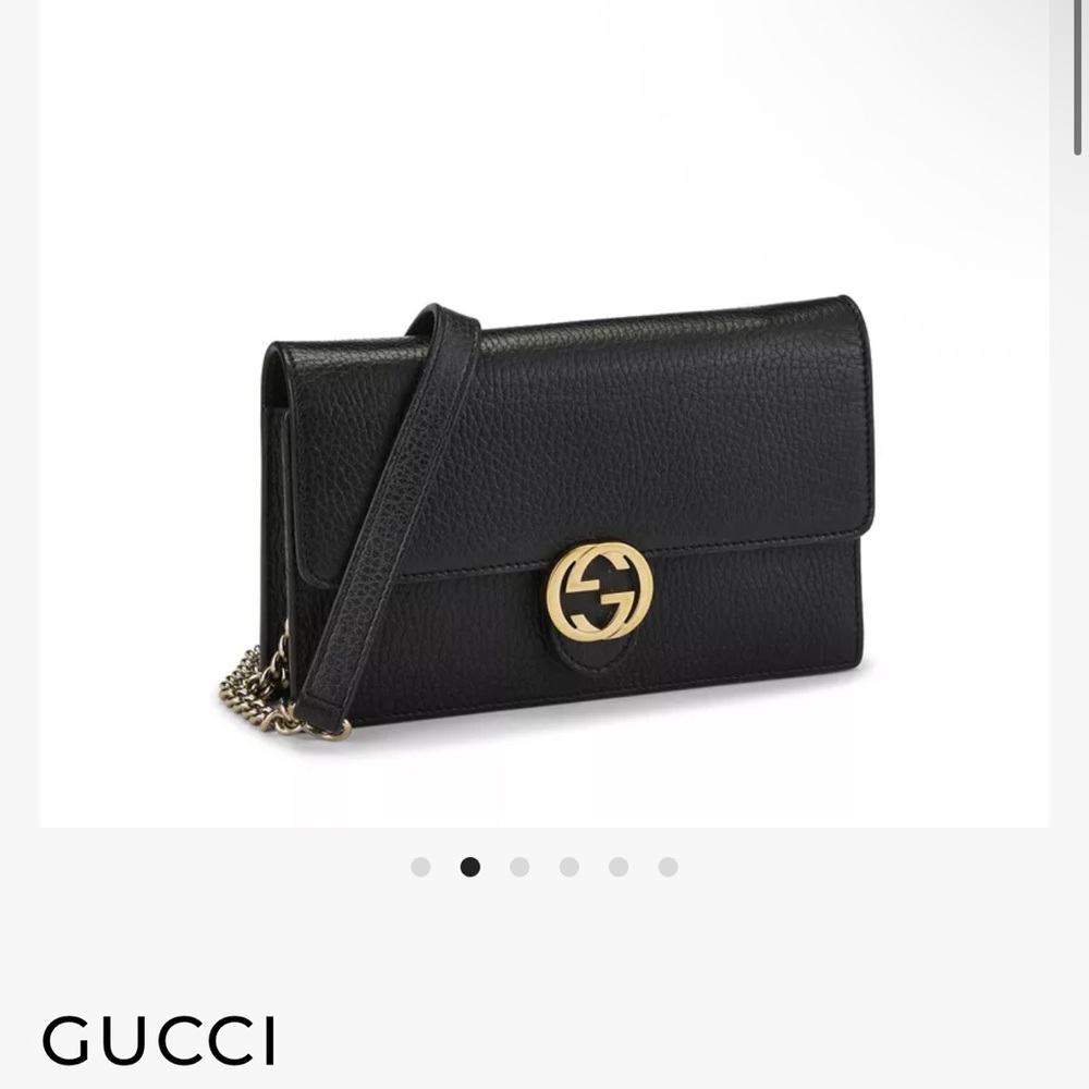 Authentic Gucci Black Leather Clutch with Gold Accent
